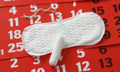 почему болит спина после месячных как при месячных